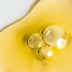 Texture huileuse riche en huiles végétales nourrissantes du Concentré Stimulant Nativence Lab